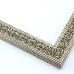 Slim, silver picture frame with classic decorative carving