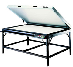 A heat press is used to infuse the substrate with the dye inks on the transfer paper 