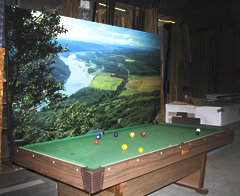 A finished gallery wrapped canvas, with pool table for size reference