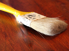 Use a clean, dry paintbrush to remove all dirt and dust from the frame