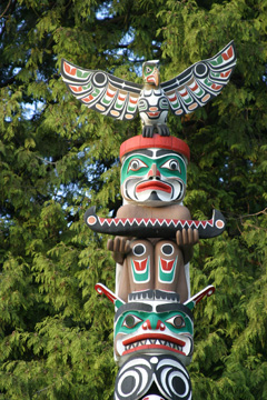 A totem pole erected at Stanley Park in Vancouver, BC