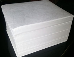 A stack of tyvek sheets cut for printing