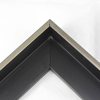 This Medium, L-shaped floating contemporary canvas frame in matte black features a thin brushed Silver face.

*Note: These solid wood, custom canvas floaters are for stretched canvas prints and paintings, and raised wood panels.