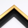 This sleek gold floater frame features a 9/16" angled profile and a 1-1/8" depth. This frame creates an elegant, contemporary appearance.