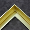 1-9/16 " stepped metal floater frame. This frame has a slim face and deep profile. It comes in Light Dumb Gold and features a horizontal brushed texture.