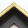 This glossy gold canvas floater frame has a U-shaped scoop face (just over 1/2 " wide) with bronze distressed scratching on the outer edges. The drop edge is black with a subtle, lined texture.

1-1/2 " rabbet depth: ideal for 1-1/2 " gallery wrapped canvas of medium or large size.  This frame looks equally striking bordering oil or acrylic paint prints and photographic prints.