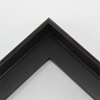 1-3/8 " curved side floated frame. The exterior curve gives elegant shape to the content of this frame. Both the face and the outer edge are dark espresso brown while the base and inside edge are solid mars black.