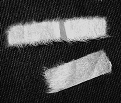 Strips of Japanese paper, a plant-based tissue used for hinging artwork
