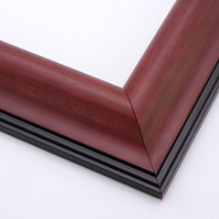 This simple, reverse scoop frame features a bevelled outer edge in matte black. The deep walnut wash highlights the wood grain and smooth curve of the inner lip.

2.5 " width: ideal for medium and large images. Pair the natural effect of the face with a bucolic farm photograph, or utilize the modern black edge by bordering a contemporary Giclée print.