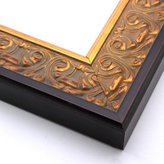 An ornate, solid wood frame featuring an intricate design overlaid with elegant gold leaf, and lightly antiqued.  A shallow scooped profile and unadorned inner edge draw the eye inward. A dark brown outer edge highlights the design.  

2.75 " width: ideal for large and extra large (oversize) artworks.  Oil paintings, prints and formal family photos will be equally at home encased in this traditional frame.