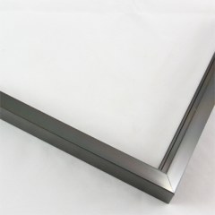 Sleek 3/8 metal frame. This frame comes in a grey-silver mirrored finish. It is highly reflective of light and creates a blurred mirror reflection. The face is smooth and the profile has a brushed metal texture.

Nielsen oem2cg Profile