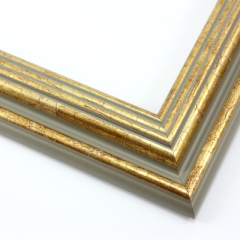 This stepped, reverse scoop frame with raised outer edge features a cracked gold foil.  The recesses of the profile are a creamy grey colour.

1.75 " width: ideal for medium size images.  A wide variety of photographs, paintings and prints will be enhanced within this unique frame.