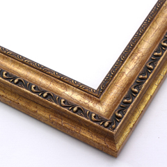 This gold foil, solid wood frame with a crown moulding profile features two distinct designs.  One tops a deep scoop with a heavily cracked, antique finish. There is a narrow row of detail on the inner lip as well.

1.75 " width: ideal for medium images. The detailed nature of this frame makes it suitable for bright or busy paintings or photographs.  It may overpower a simpler image.