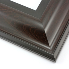 This wide, reverse scoop frame features a deep brown wash that highlights the natural wood grain.  The bevelled outer edge and stepped inner lip are matte black.

3.5 " width: ideal for oversize images. Bright acrylic and oil paintings or their giclee prints will shine in this classic frame.
