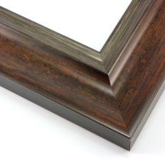 This elegant frame has a double scoop profile.  The outer, wider scoop brings out the natural wood in a deep golden brown. The inner lip features a subtle silver foil finish that maintains the wood grain.

2.5 " width: ideal for large and extra large images. Border a bold watercolour or oil painting, or your favourite Giclée print, in this stylish, classic frame.