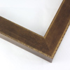Slightly angled 1-5/8 " frame with an indented design on the inner and outer edge. The face is a cool dark brown stain brushed over a soft gold base. The accented inner and outer edge reveal more of the soft gold color underneath.