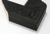 This stone-like frame appears in a black finish featuring an extra wide 4-7/8 " profile. This extravagant frame features an ornate carved texture profile that is perfect for a dramatic and classy appearance.