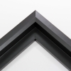 Unique geometric 1 " floater. The face of this molding features an off center peak which gives it a unique contrast in the right lighting.  This frame comes in solid mars black with a dull satin finish.
