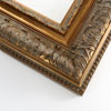 This 3-1/2 " Classic gold-brown frame features an elegant leaf design, and a beaded outer lip. The face is a grey-brown patina with dark gold highlights on the edges of the design and on the inner bevel.