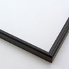 This simple metal picture frame has a smooth, frosted black finish, brush-textured drop edge and a curved profile.

.375 " width: ideal for small and medium artworks. Easily frame photographs, thicker cloth or needlework art, or even Giclée canvas prints.
