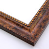 This solid wood frame achieves simple elegance with an unadorned scoop profile and beading along the inner edge.   A gold leaf and brown-red base are spackled with dark brown for a unique, vintage marbled look.  The beading feature the same technique.

2 " width: ideal for medium-size artworks.  Paintings, prints, or your favourite family photos will suit this stylish, classic frame.