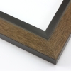 This unique frame with a raw wood face features long edge grain texture and a grey-tone brown wash.  The frame forms a shallow V, with the matte black inner lip sloping out and then rising again (see illustration). The outer drop edge is also matte black.

2 " width: ideal for medium size artwork.  The modern style of this frame makes it a great match to more contemporary paintings and photography.