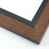 This unique frame with a raw wood face features long edge grain texture and a classic brown wash.  The frame forms a shallow V, with the matte black inner lip sloping out and then rising again (see illustration). The outer drop edge is also matte black.

2 " width: ideal for medium size artwork.  The modern style of this frame makes it a great match to more contemporary paintings and photography.