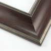 This bold frame features a steep reverse scoop profile with a mahogany wash that highlights the natural wood grain.  The inner lip drops sharply in toward the image; both edges are brushed with a subtle silver leaf.

3 " width: ideal for large or oversize artwork. Select a strong image for this frame, to ensure the heavy border doesn